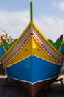 Malta, Marsaxlokk. Marsaxlokk harbor. Luzzijiet, colorful traditional Maltese fishing boats. Art Print